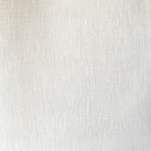 May include: A close-up shot of a white linen fabric. The fabric has a textured appearance with visible woven threads. The color is a bright, clean white, suggesting a natural textile. The weave is tight, indicating a high-quality material.