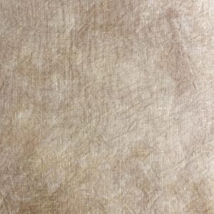 May include: Close-up of a beige linen fabric with a textured surface. The fabric has a subtle, mottled appearance with variations in color, creating a vintage or rustic aesthetic. The weave is visible, adding to the tactile quality.