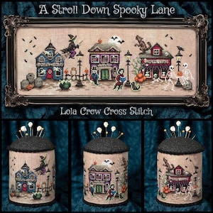 May include: A cross stitch pattern titled A Stroll Down Spooky Lane by Lola Crow Cross Stitch, featuring a Halloween scene with houses, a witch, skeletons, and pumpkins. Below, three cylindrical pin cushions display the same stitched design.