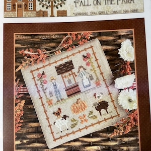 May include: Cross stitch pattern for a fall themed design featuring a well, a pumpkin, a rooster, a sheep, and a cow. The pattern is titled "Fall on the Farm" and is from Little House Needleworks. The text "Wishing You Well Chart No. Nine" is also included.