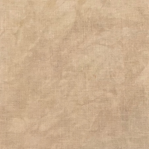 May include: A close-up shot of a tan-colored fabric with a textured, woven appearance. The fabric has a slightly wrinkled look, with variations in tone creating a subtle, aged effect. The material appears to be linen or a similar natural fiber.