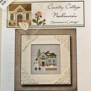 May include: Cross stitch pattern for a winter scene with a cottage, snowman, and trees. The pattern is titled "Snowman's Cottage" and is from Country Cottage Needleworks. The pattern is called "Frosty Forest".