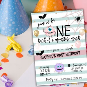 May include: A teal and pink striped invitation with a monster theme. The invitation says "Join us for one heck of a monster mash" and "Georgie's First Birthday". The invitation includes a spider web, a spider, and two monsters.