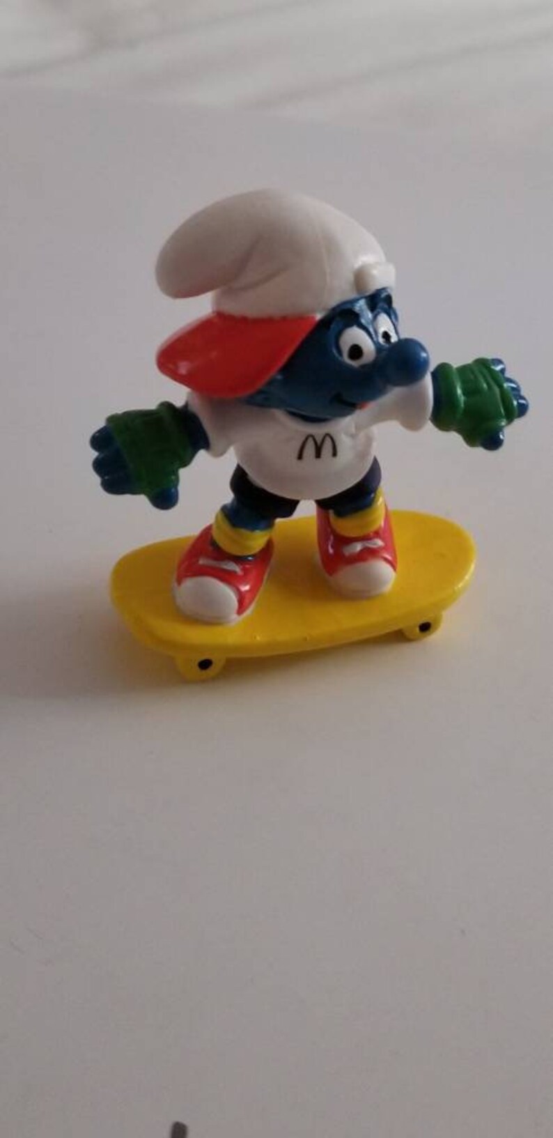 handy smurf figurine