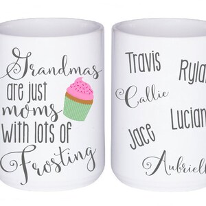 May include: White ceramic mug featuring the text "Grandmas are just moms with lots of frosting" and a cupcake illustration. The other side of the mug has names printed on it: Travis, Rylan, Callie, Jace, Luciano, and Aubriella.
