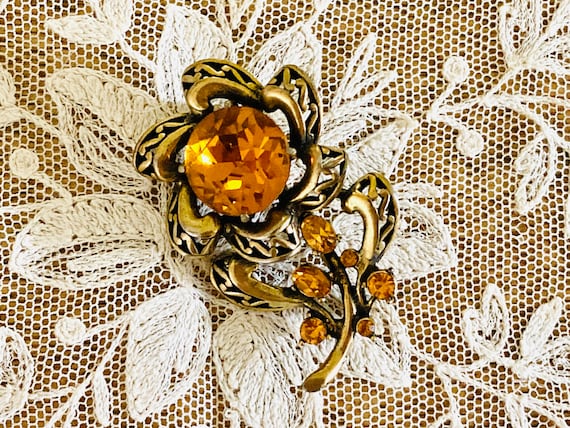 HollyCraft Gold Tone Brown Enamel and Rhinestone Swirled Flower