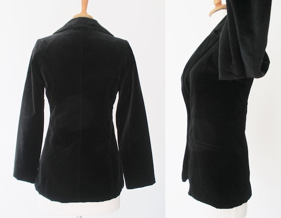 Zwarte jaren '70 getailleerde vintage fluwelen jas met Zwarte jaren '70 getailleerde vintage fluwelen jas met