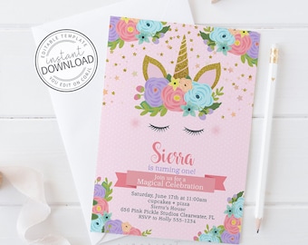 May include: A pink invitation card featuring a gold glitter unicorn horn, floral crown, and closed eyes. The text reads: Sierra is turning one! Join us for a Magical Celebration, Saturday, June 17th at 11:00am, cupcakes + pizza, Sierra's House.
