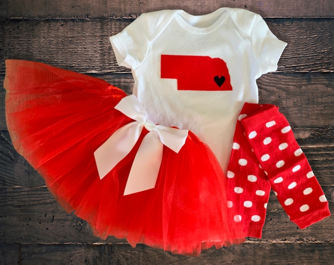 Nebraska Baby bodysuit with matching red tutu and red and white polka dot leg warmers