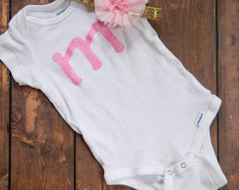 Custom Monogrammed Light Pink Letter Outfit worh matching gold and pink sparkly elastic headband