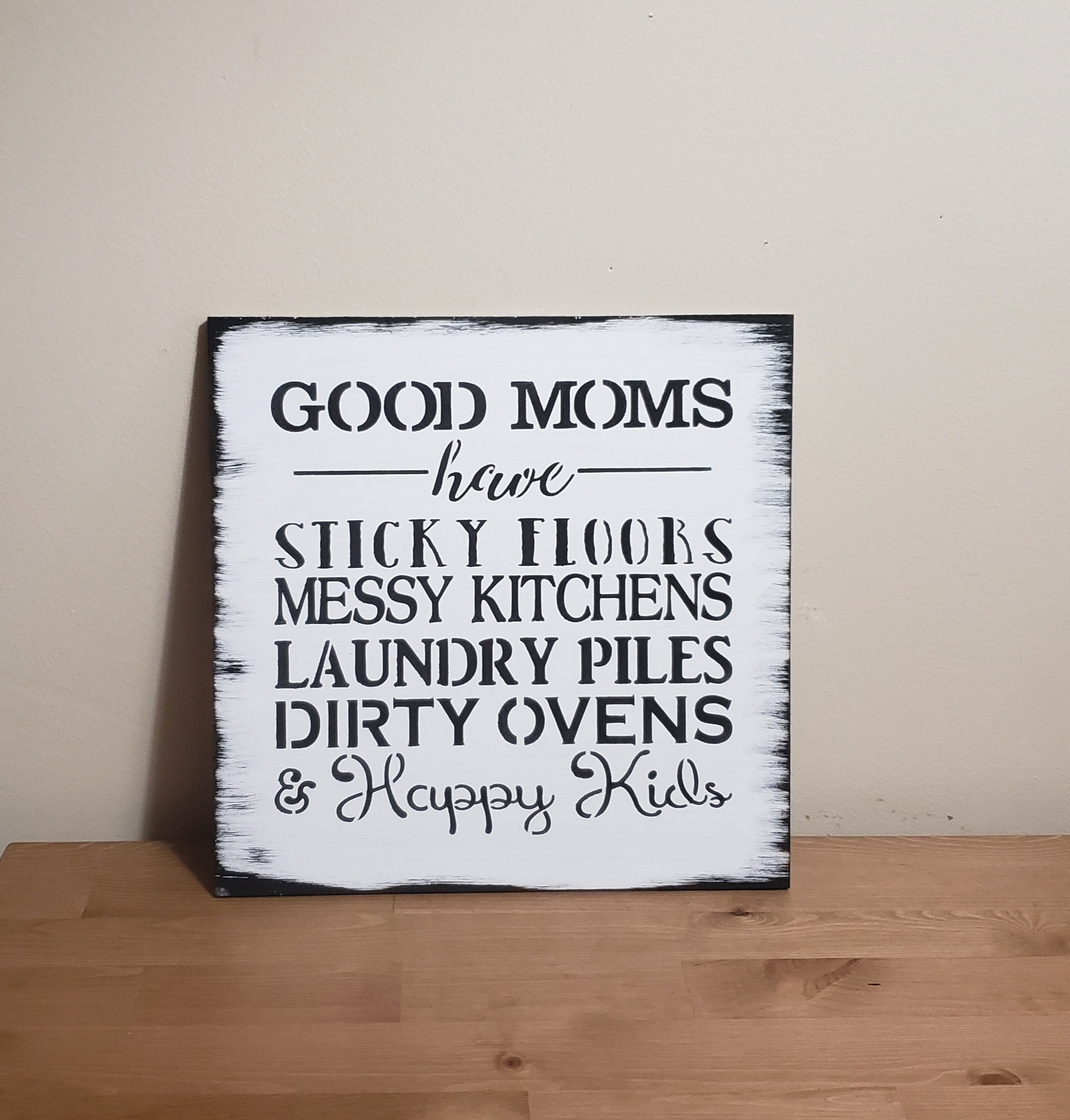 10" x 4" Wood Sign Good Moms Have Sticky Floors Messy Kitchens Happy Kids 10" x 4" Wood Sign Good Moms Have Sticky Floors Messy Kitchens Happy Kids
