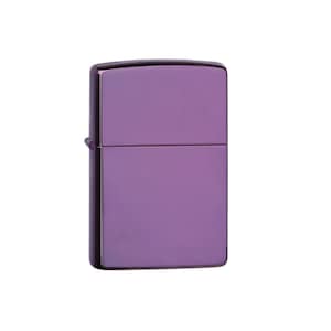 May include: A purple metal lighter with a smooth, shiny finish.
