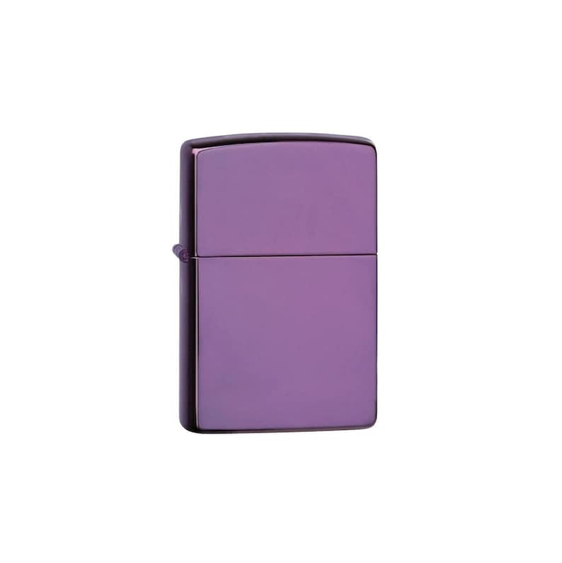 May include: A purple metal lighter with a smooth, shiny finish.