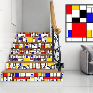 May include: A set of stairs with a geometric pattern in red, yellow, blue, and black. The pattern is reminiscent of a famous abstract painting. The stairs are in a modern home with a white wall and a gray couch.