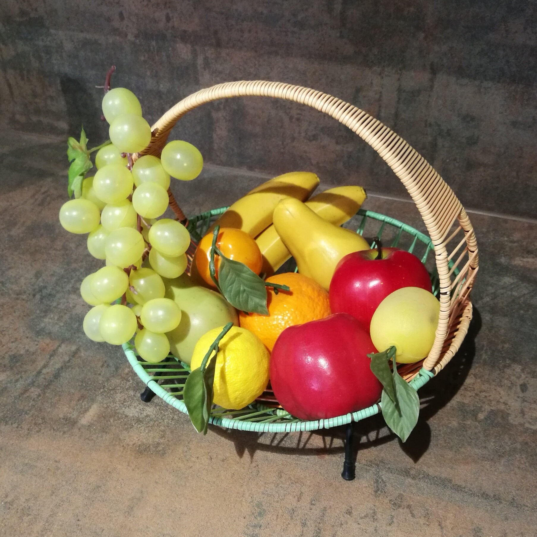 Fruit basket with plastic wickerwork and decorative fruit made of plastic Original 1960s Vintage