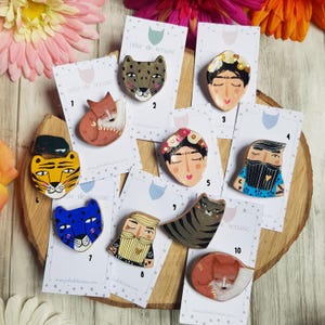 Hand painted brooches made from self-hardening clay