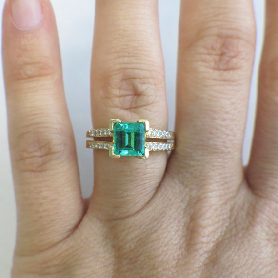 Synthetic Emerald and Diamond Accented Split Shank 14… Gem