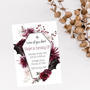 May include: A black and white invitation with a gothic theme. The invitation features a coffin-shaped frame with a spider and bats. The text reads "Come if you dare! Violet is turning 13!" with details about the party, including the date, time, address, and RSVP information.