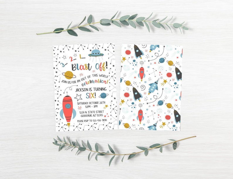 May include: Two-sided invitation with a space theme. One side features a rocket, planets, stars, and the text "Blast Off!" and "Jackson is turning SIX!". The other side has a repeating pattern of rockets, planets, and stars. The invitation is decorated with eucalyptus.