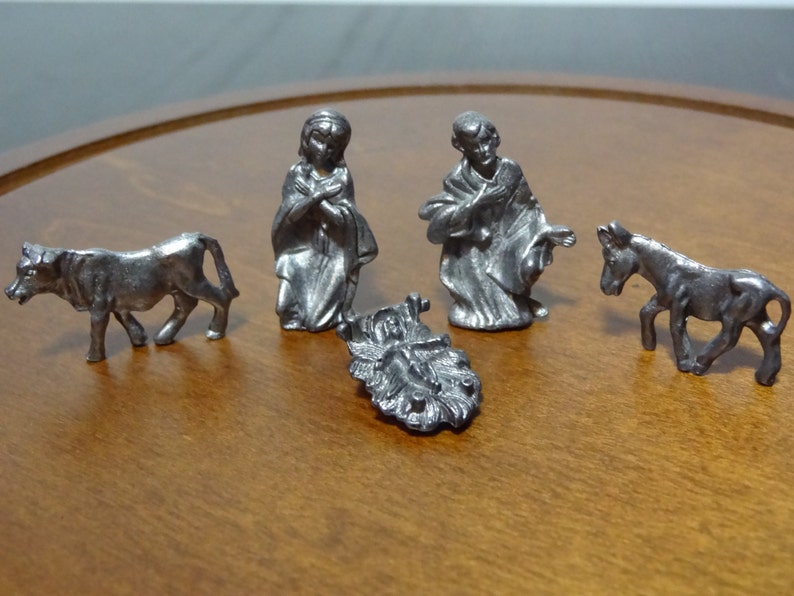 tiny pewter figurines