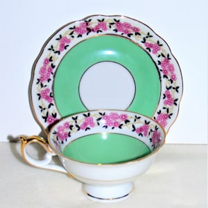 RARE:  Royal Bayreuth Tea Cup and Saucer Mint Green with Pink & Black Flowers Bone China Porcelain  Bavaria Germany