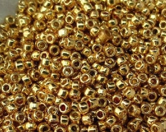 TOHO 15/0 Permanent Finish Galvanized Starlight Gold round, 5 grams *Wholesale* (557)