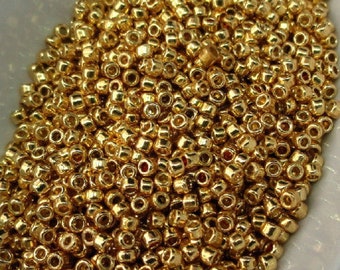 TOHO 15/0  Permanent Finish Galvanized Starlight Gold round, 10 grams *Wholesale*