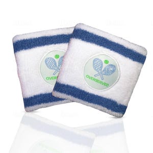 May include: Two white terry cloth wristbands with blue stripes and a circular patch featuring crossed tennis rackets and a tennis ball. The patch reads "OVERSERVED" in green text. The wristbands are designed for tennis.