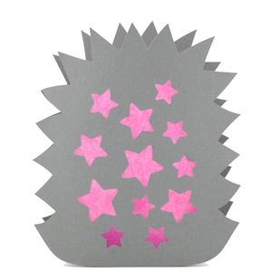 May include: A gray paper cutout in the shape of a hedgehog with jagged edges, featuring multiple pink star-shaped cutouts across its surface. The text KerstinBremer.de is printed in the bottom right corner of the image.