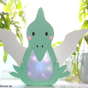 Dino lantern SVG DXF plotter file with craft instructions for download, St. Martin&#39;s lantern template Dinosaur Pteranodon St. Martin craft DIY
