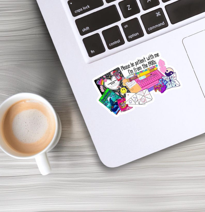 May include: A sticker with a collage of 90s themed items, including a notebook, a pencil, a calculator, a heart, a smiley face, a paper airplane, a game of tic-tac-toe, and a yin-yang symbol. The text on the sticker reads "Please be patient with me I'm from the 90s".
