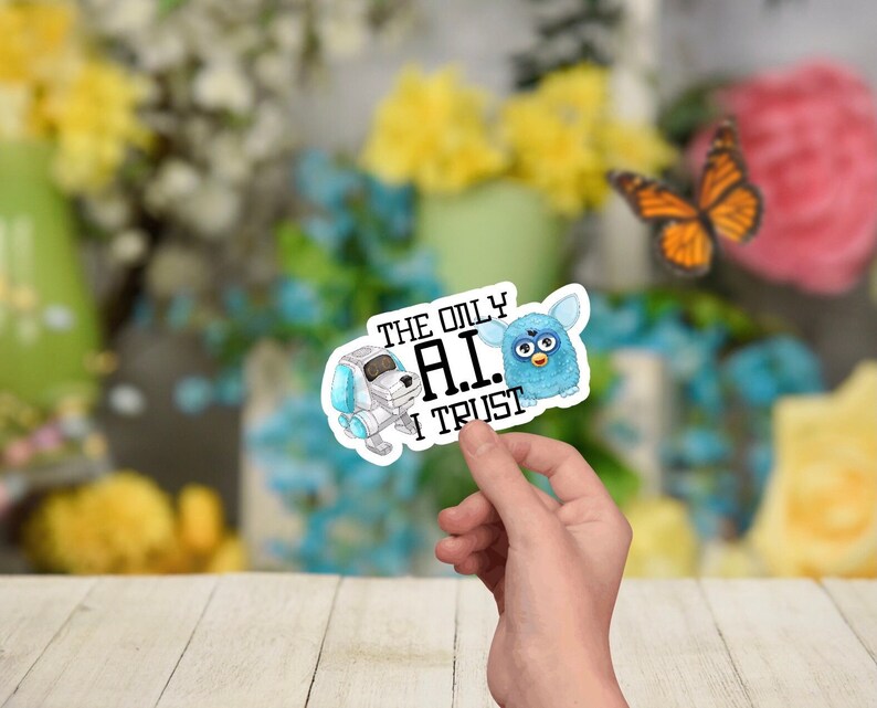 May include: A sticker with a white robot dog and a blue fuzzy creature with the text "The only A.I. I trust".