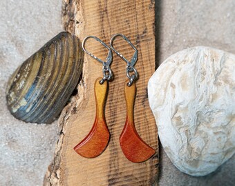 beautiful pair of light earrings made of multi-layered glued birch wood.