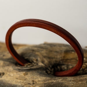 open bangle made of multi-layer-glued birch wood, elastic and water-resistant