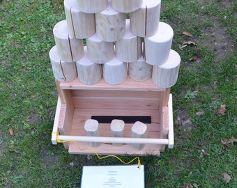 Wooden Can Throwing®, outdoor game