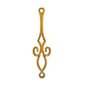 May include: Gold metal connector with a decorative design, featuring two loops at the top and bottom.