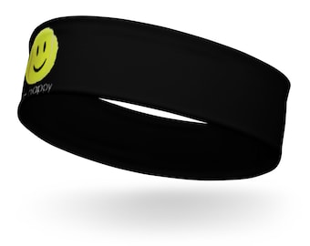 May include: Black headband with a yellow smiley face and the words "be happy" in white. The headband is made of a stretchy material. This accessory is designed to fit comfortably around the head and is suitable for workouts or everyday wear.