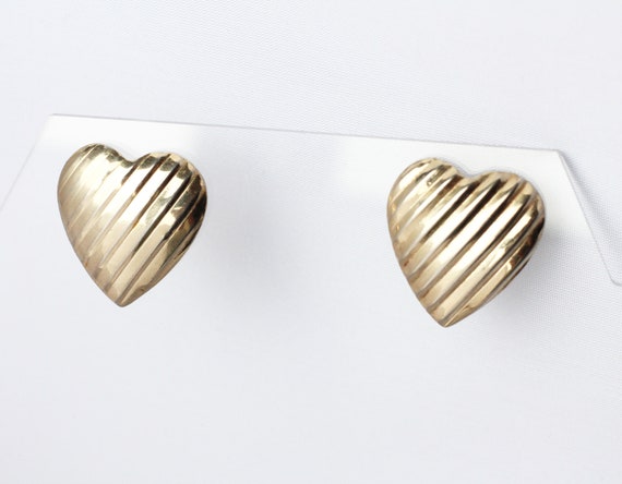 Gold Tone Ribbed Heart Earrings - image 1
