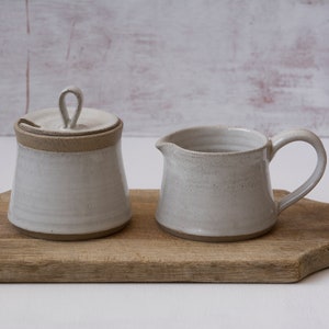 Creamer and Sugar, Set of a Pottery Sugar Bowl and a Pitcher Rustic White