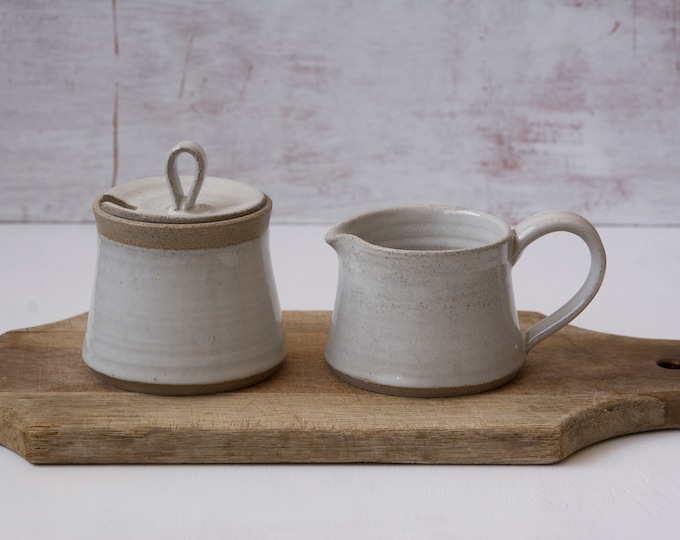 Set of a Pottery Sugar Bowl and a Pitcher