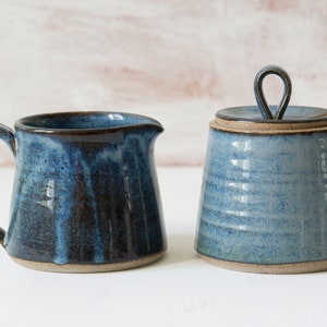Creamer and Sugar, Set of a Pottery Sugar Bowl and a Pitcher Variegated BlueGreen