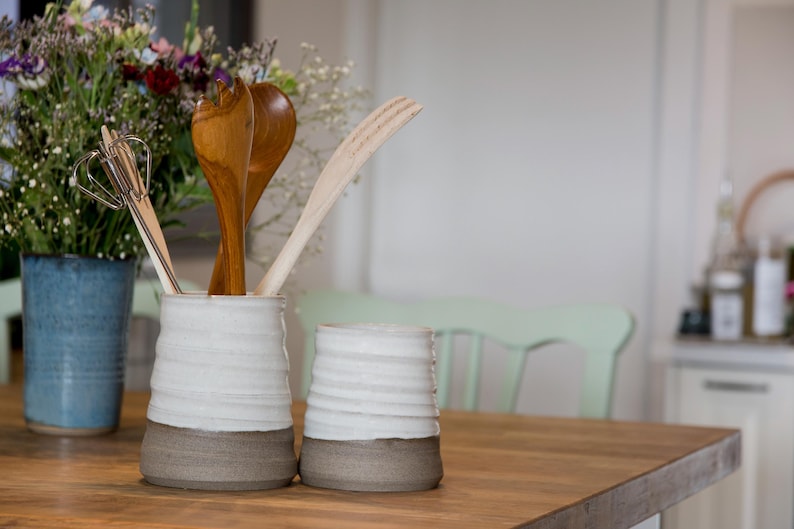 Pair of rustic crocks perfect for kitchen storage or as a centerpiece