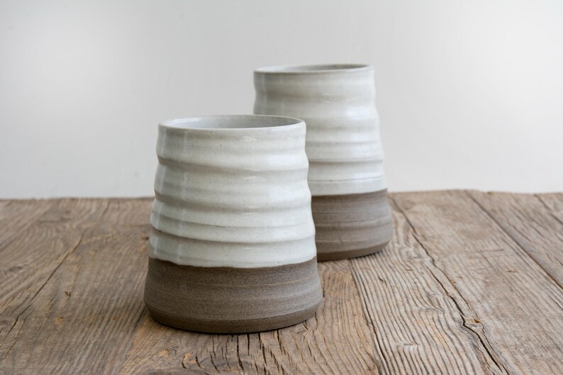 Close-up of grooves on a handcrafted crock, revealing artisan craftsmanship