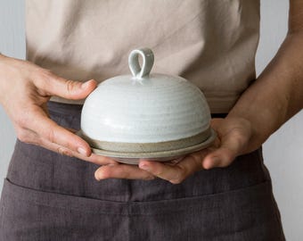 Burriera rotonda in ceramica con coperchio