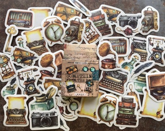 46pcs retro style sticker box 'something from the past', typewriter, old letters, quill, radio, camera, suitcases, globe and more