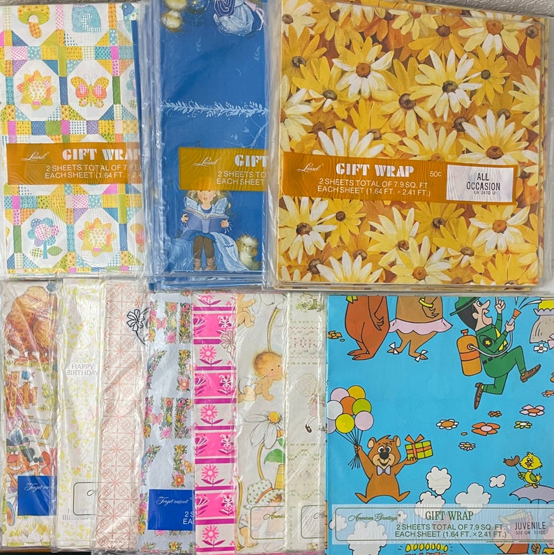 May include: Assortment of colorful gift wrap paper sheets with various patterns, including floral, geometric, and cartoon designs. The sheets are packaged in plastic and labeled with the text "Gift Wrap" and the size of each sheet in feet.