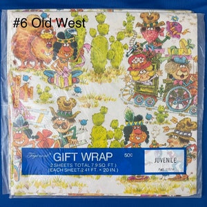 May include: A vintage gift wrap featuring a cartoon illustration of cowboys and Native Americans in a Western setting. The paper is white with a yellow and brown pattern. The text on the paper reads "Gift Wrap 2 sheets total 7.9 sq. ft. (each sheet 2.41 ft. x 20 in.) 50c Juvenile FWS 1157 H".
