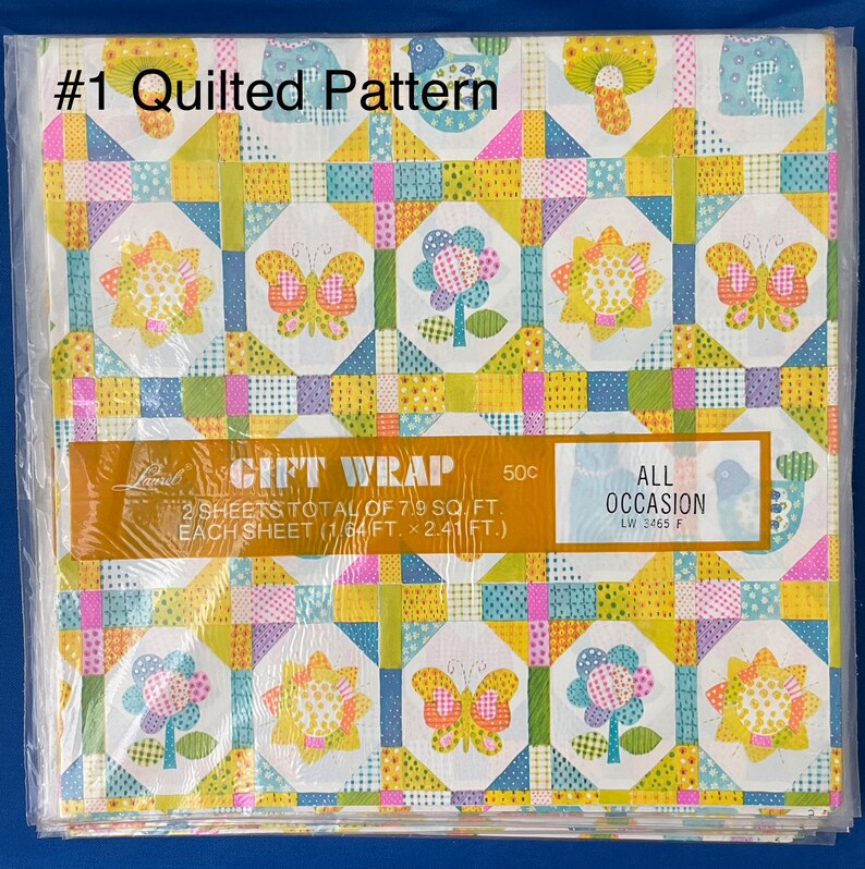 May include: A package of two sheets of gift wrap featuring a quilted pattern with butterflies, flowers, and birds. The wrap is yellow, blue, pink, and green. The package says "#1 Quilted Pattern" and "Gift Wrap 50c".