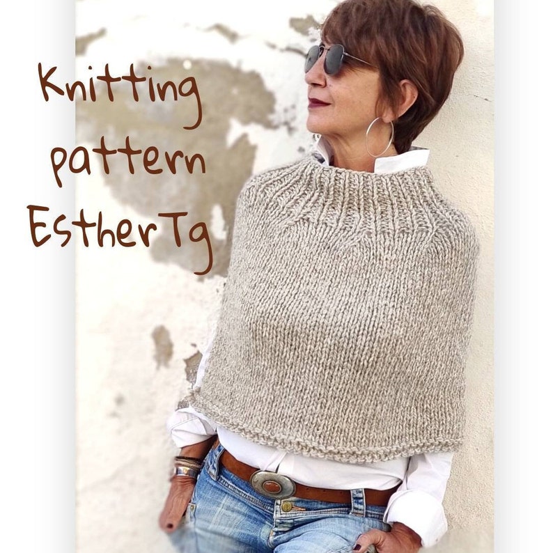 May include: Knitting pattern for a beige knitted poncho with a high neck. The pattern is called "Esther Tg".