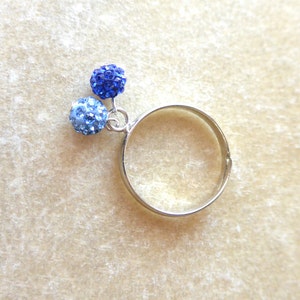 Silver adjustable Ring with 2 balls of blue strass. image 2